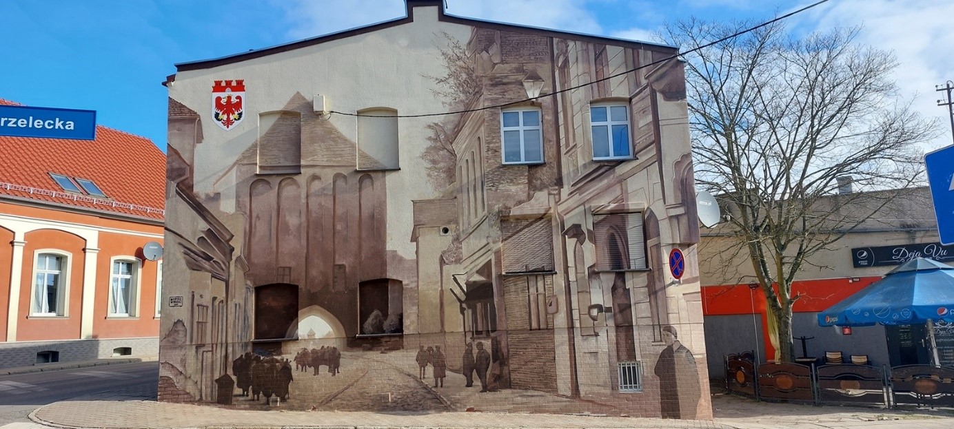 Mural przedstawiający bramę Kostrzyńską 